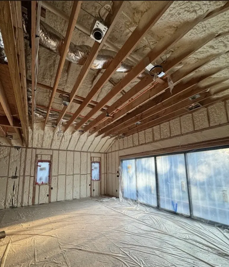 Interior walls and ceiling insulated with spray foam during new construction in South Houston